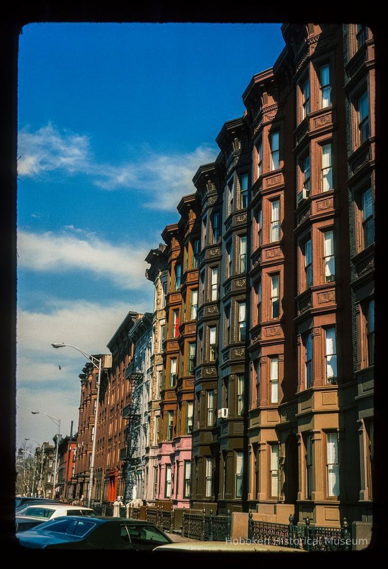 Color slide of eye-level view of row houses on Washington between 8th & 9th looking NE picture number 1