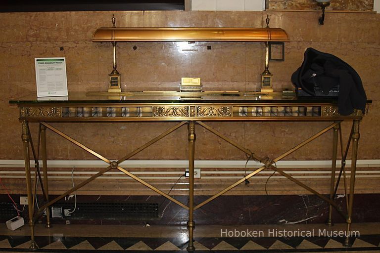 Desk as found against north wall, west end of main banking room