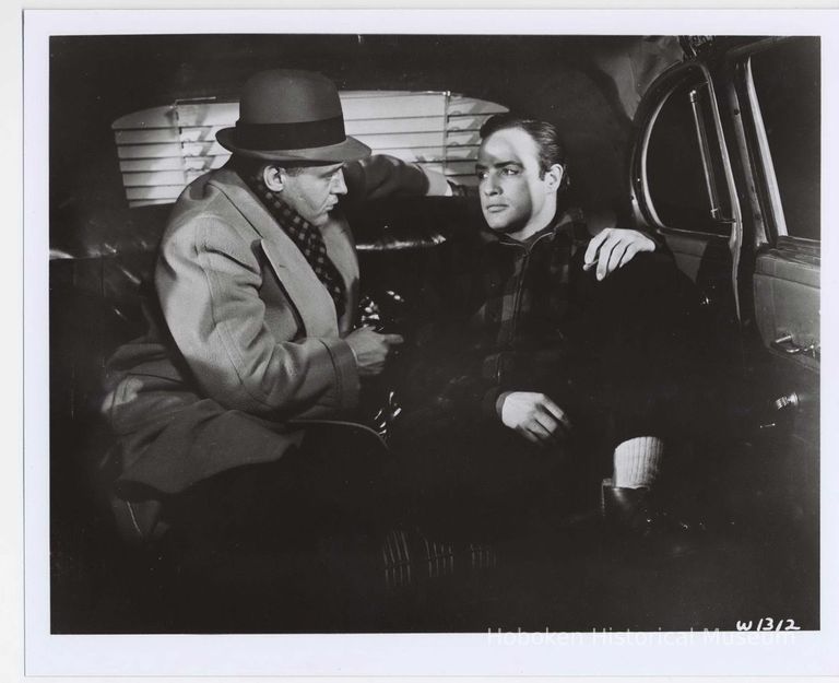 B+W publicity photo of Rod Steiger as Charley Malloy and Marlon Brando as Terry Malloy in film 