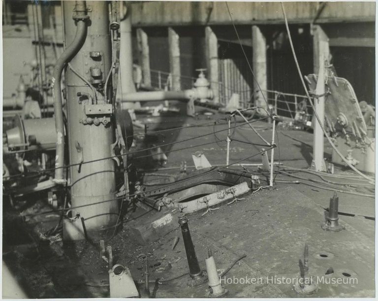 B+W photo showing damage on the main deck on unidentified vessel at the Bethlehem Steel Shipyard, Hoboken Division, no date, ca. 19 picture number 1