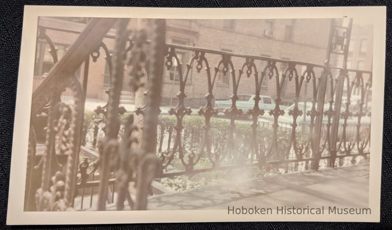 Front porch railing of 64 10th Street Hoboken.