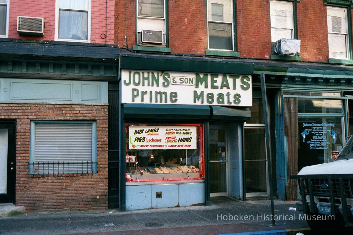 Color photo of sign for John's & Son Meats, 305 First St, Hoboken, Jan. 3 & 4, 2002. picture number 1