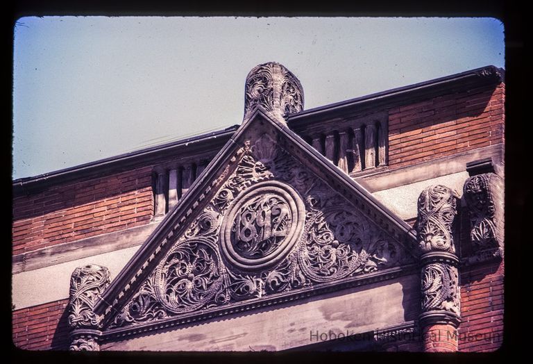 Color slide of close-up view of pediment reading 