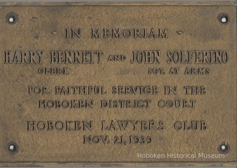 Bronze plaque: In Memoriam. Harry Bennett, Clerk & John Solferino, Sgt. at Arms, ...Service in the Hoboken District Court. Hoboken Lawyers Club, Nov. 21, 1939. picture number 1