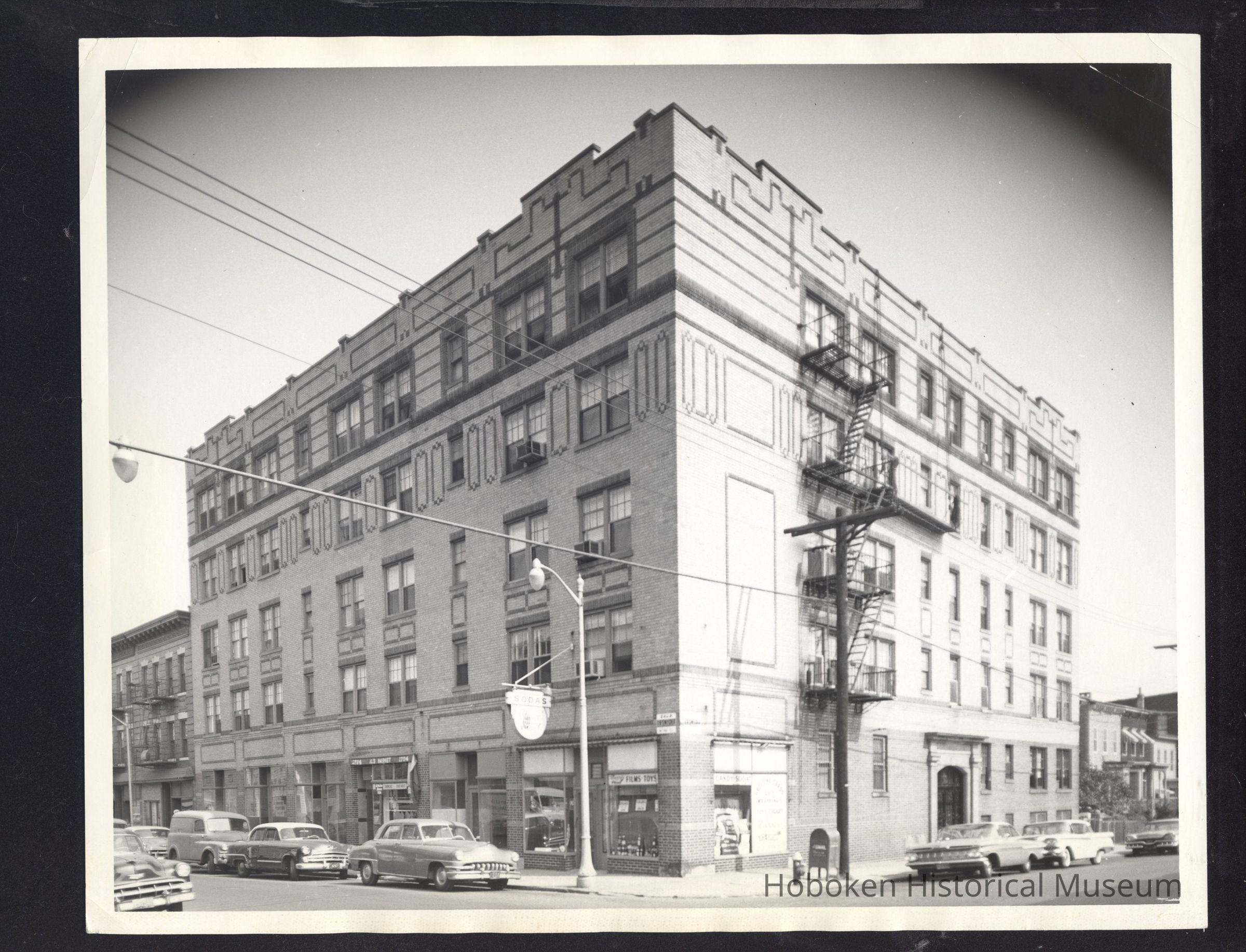 B&W photo of mixed-use apartment building at 1700 Bergenline Avenue, Union City. picture number 1