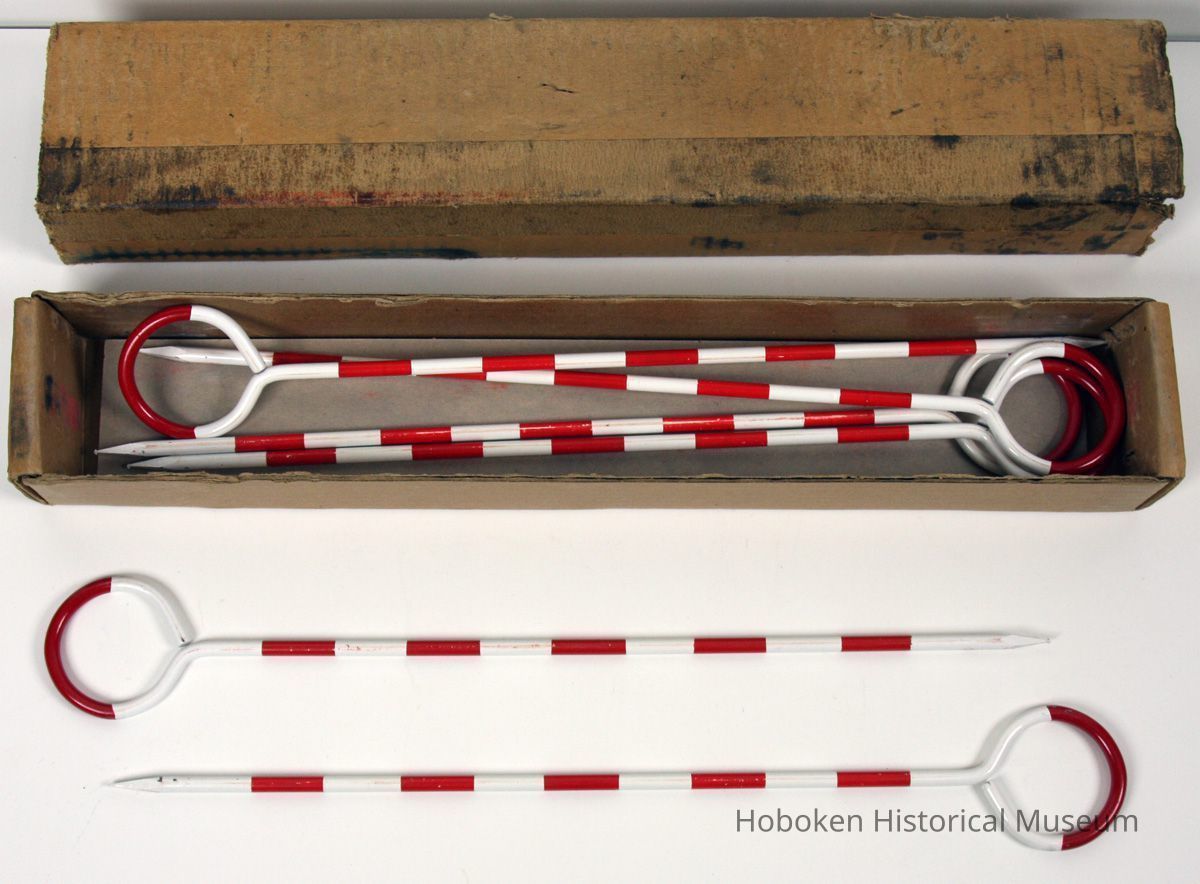 arrows (stakes) and open carton