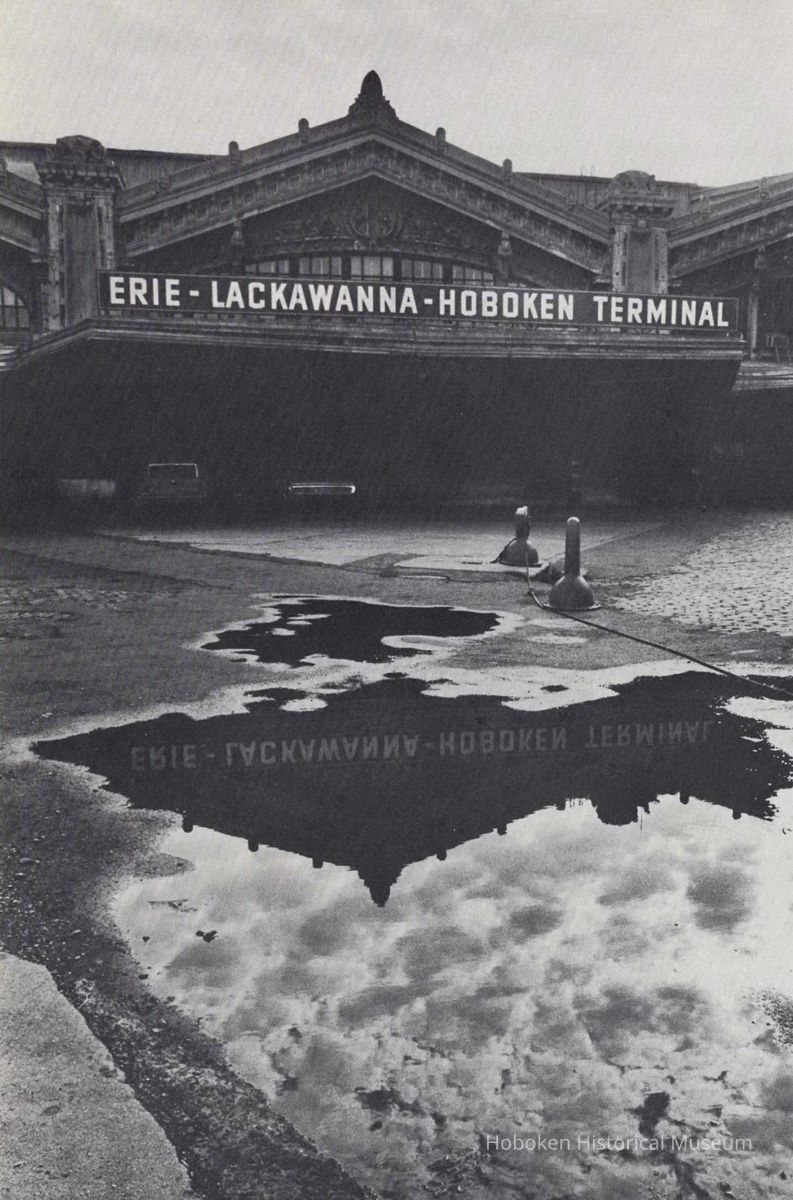 Reference image of printed photo image of Erie-Lackawanna Hoboken Terminal exterior from pg 30 of archives catalog 2002.026.0002, Hoboken, ca. 1975. picture number 1