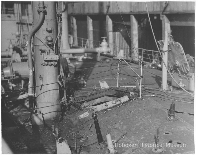 B+W photo showing damage on the main deck on unidentified vessel at the Bethlehem Steel Shipyard, Hoboken Division, no date, ca. 1940. picture number 1