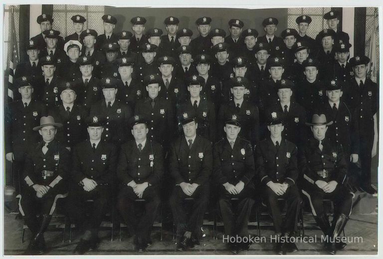 Color copy photo of a B+W group photo of the Hoboken Police Department, Hoboken, no date, ca. 1950's. picture number 1