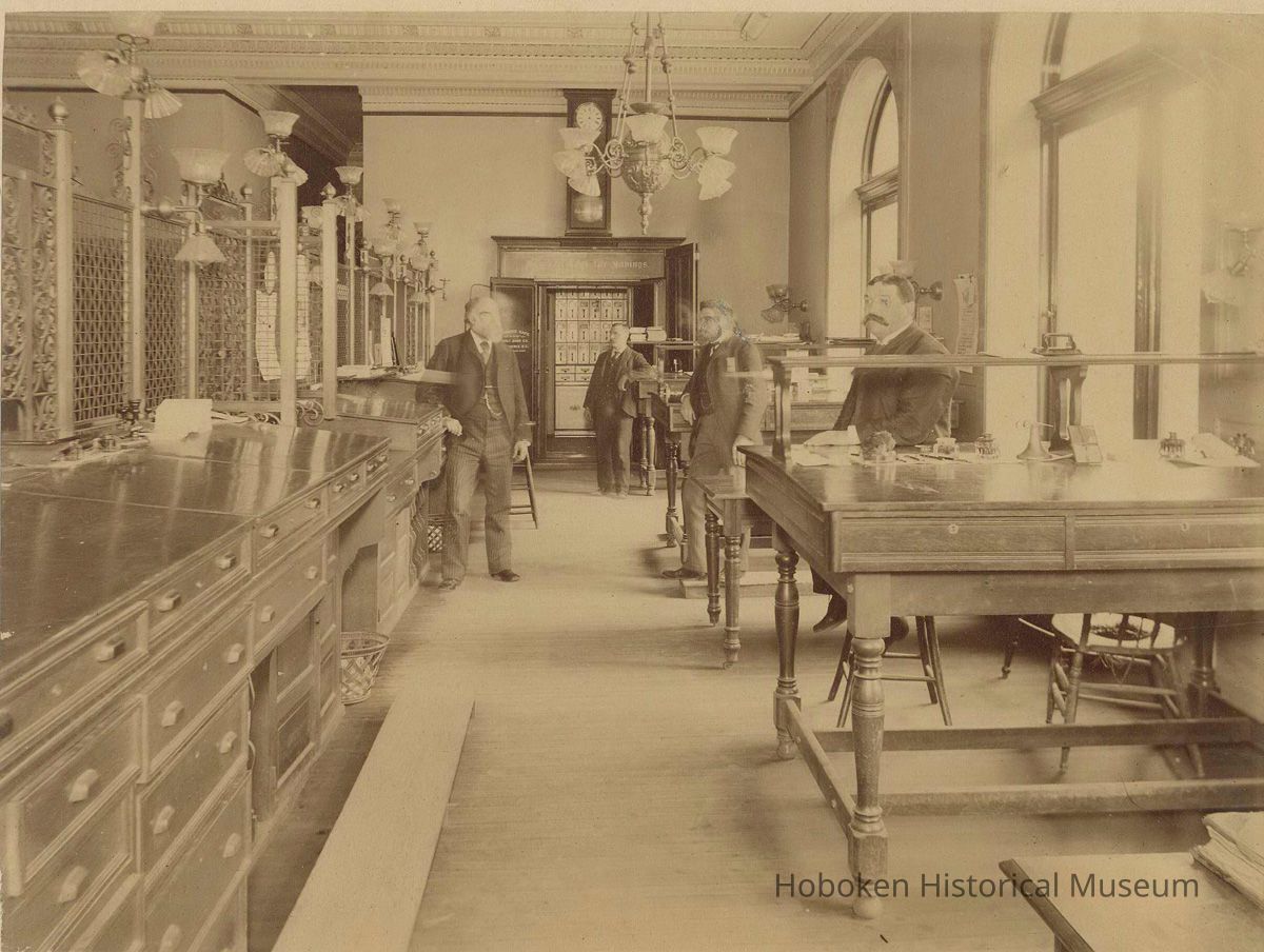Sepia-tone photo of the Counting Room of the Hoboken Bank for Savings, Hoboken, Feb. 2, 1894. picture number 1