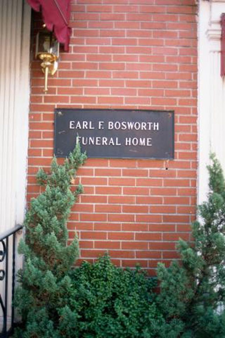 Color photo detail of metal wall sign for Earl L. Bosworth Funeral Home, 311 Willow Avenue, Hoboken, Sept., 1-5, 2001. picture number 1