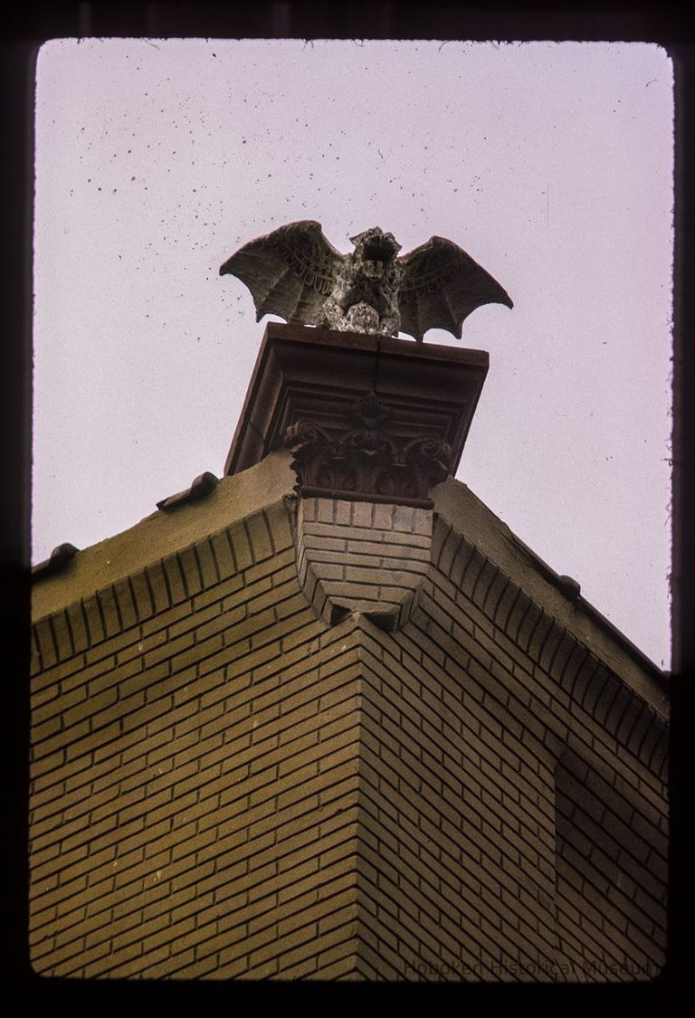 Color slide of close-up front view of gargoyle on a building on Jefferson and 4th picture number 1