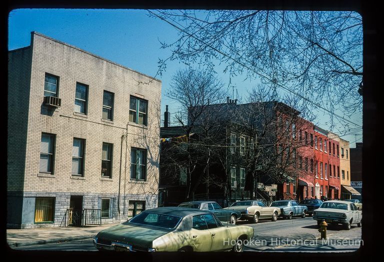 Color slide of eye-level view of row houses on the N side of 5th between Park and Garden looking E picture number 1