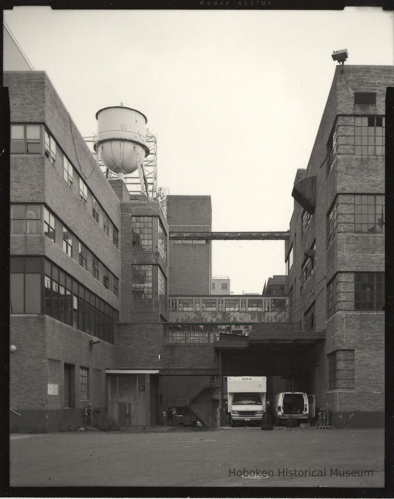 B+W photo of former Maxwell House Coffee plant exterior, between Manufacturing Building, left, & Soluble Building, Hoboken, 2003. picture number 1