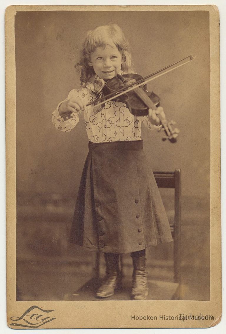 front: boy with violin