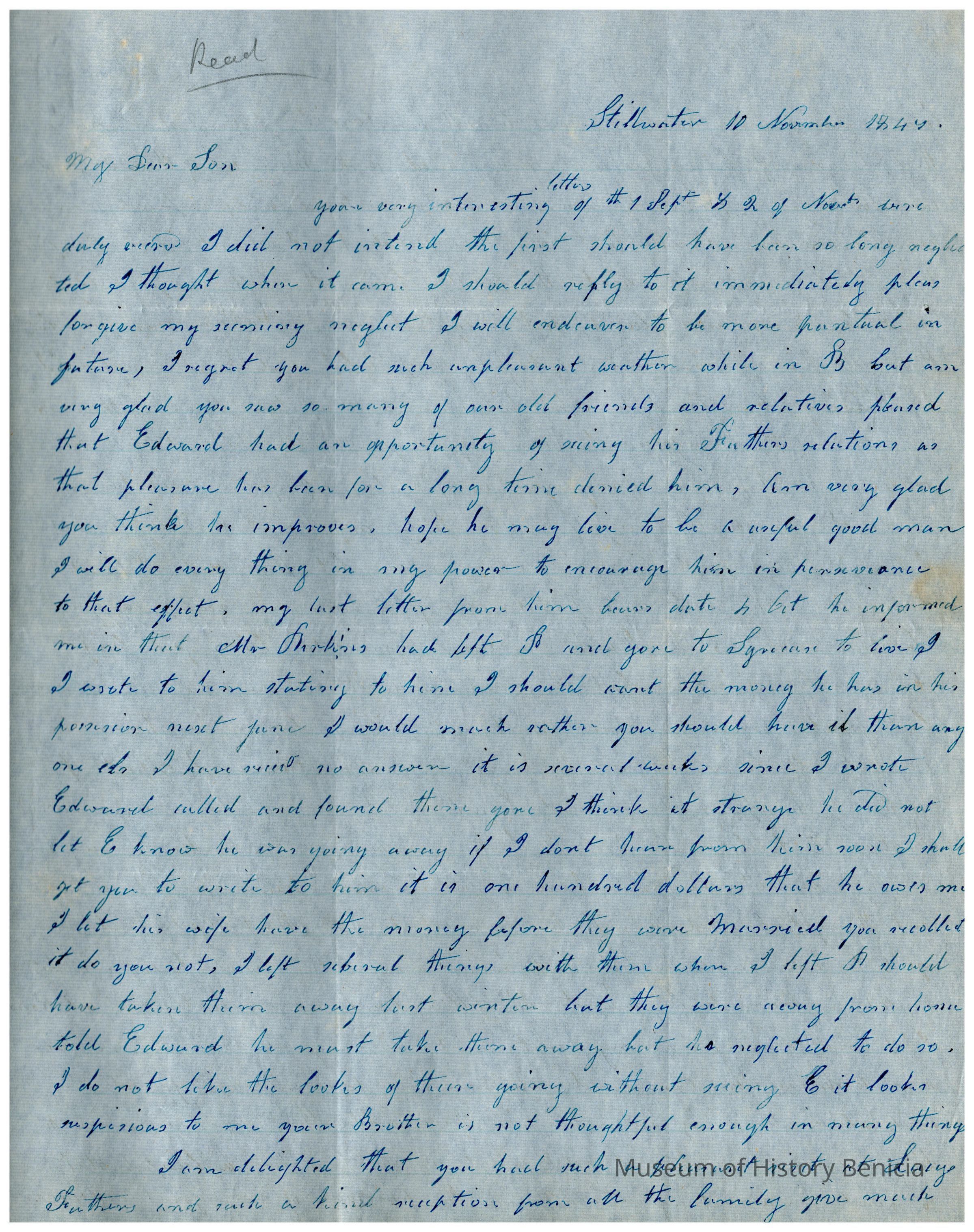 The image shows an old, handwritten letter on blue paper, dated "Stillwater 11 November 1849," addressed to "My Dear Son." The letter is written in neat cursive and discusses topics like family, friends, financial matters, and correspondence. The writer mentions neglect in replying promptly and expresses happiness over the recipient's improvement and interaction with friends. They discuss financial concerns, mentioning a sum of one hundred dollars that Joanna had given to Edward's wife which she now wishes he should give to Samuel.