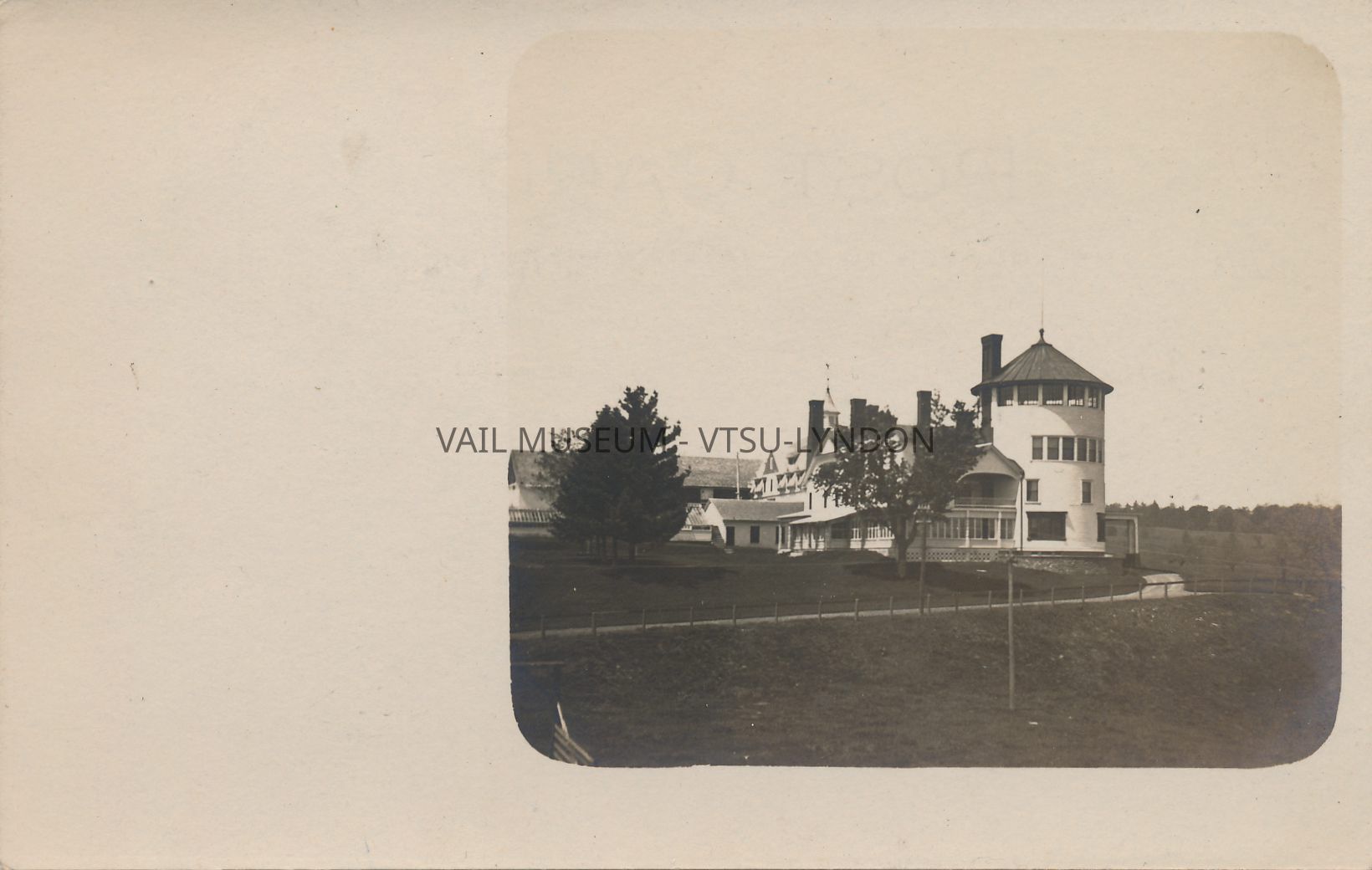 T.N. Vail’s Mansion with only the north tower complete. Photo postcard dates from 1905. Construction of the north tower was completed in 1901. Construction of the south tower would not begin until 1907.: Vail Mansion as seen from the southeast. Note the small structure next to the tower with the peaked roof. As construction projects continued through Vail’s tenure in the house, this structure was all that remained visible of the original Bigelow farmhouse Vail purchased in 1883.