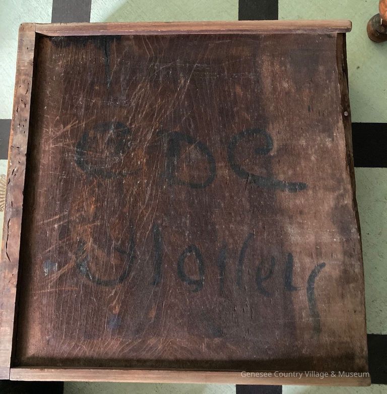 "CDC/ Holley" in black paint on underside of bottom drawer