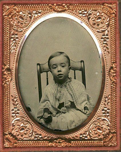 Boy in Knit Cape, Holding Cookie