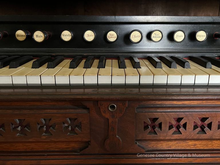 Detail of knobs, keys, and carvings