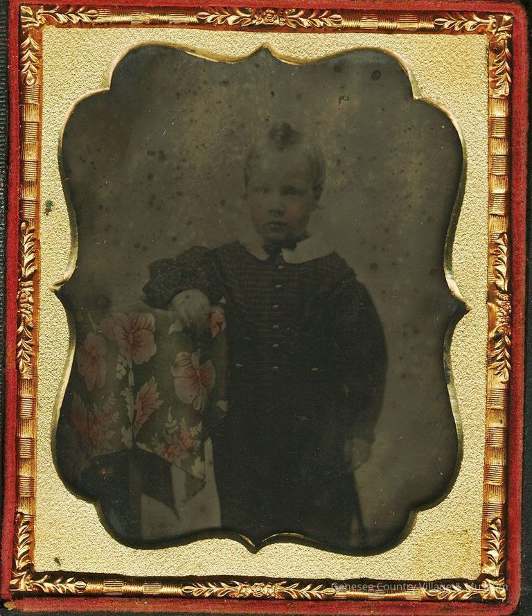 Boy Next to Fancy Tablecloth