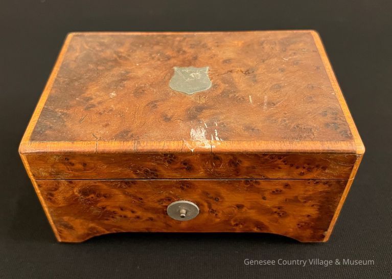 Closed box with shield on top