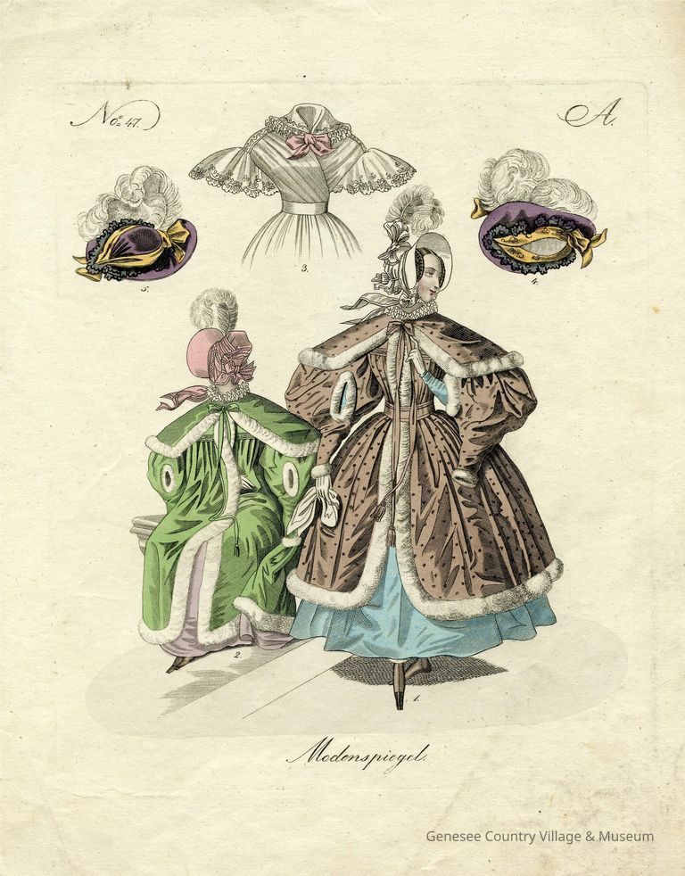 2 Ladies Showing a Fancy Coat / Cape