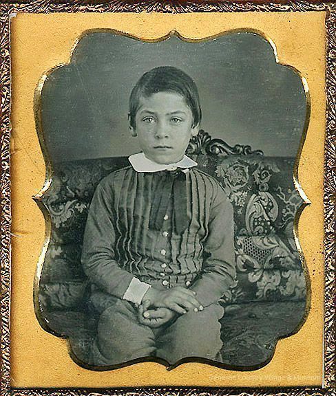 Boy on Elegant Sofa