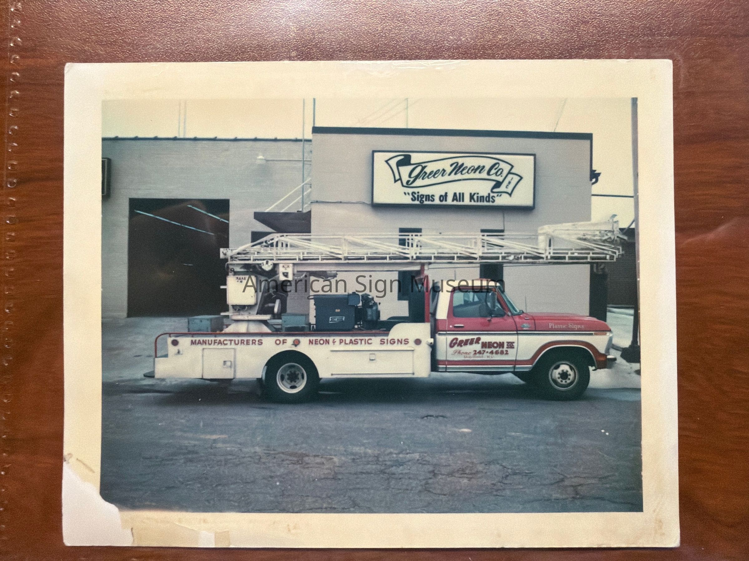 Greer Neon Co. Ladder Truck and Building Photograph picture number 1