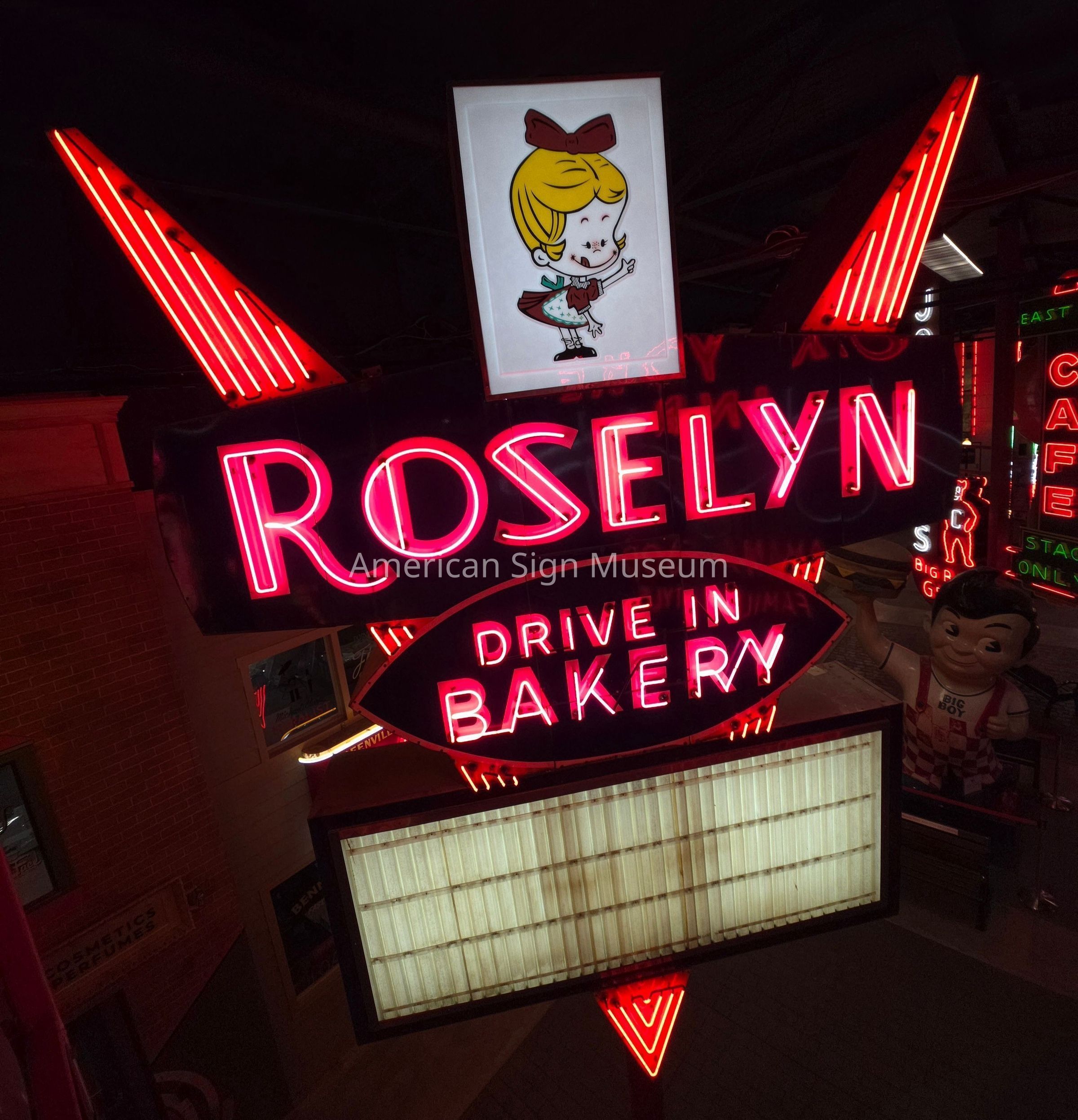 Image of Roselyn Bakery taken July 20th, 2026 by Bing Reising after the installation of the plastic facing at the top.