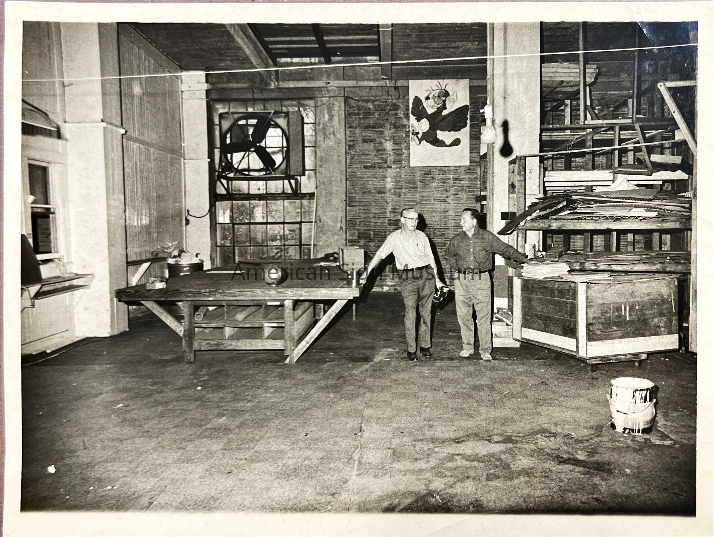 Sign Shop Interior with Workers - Photograph picture number 1