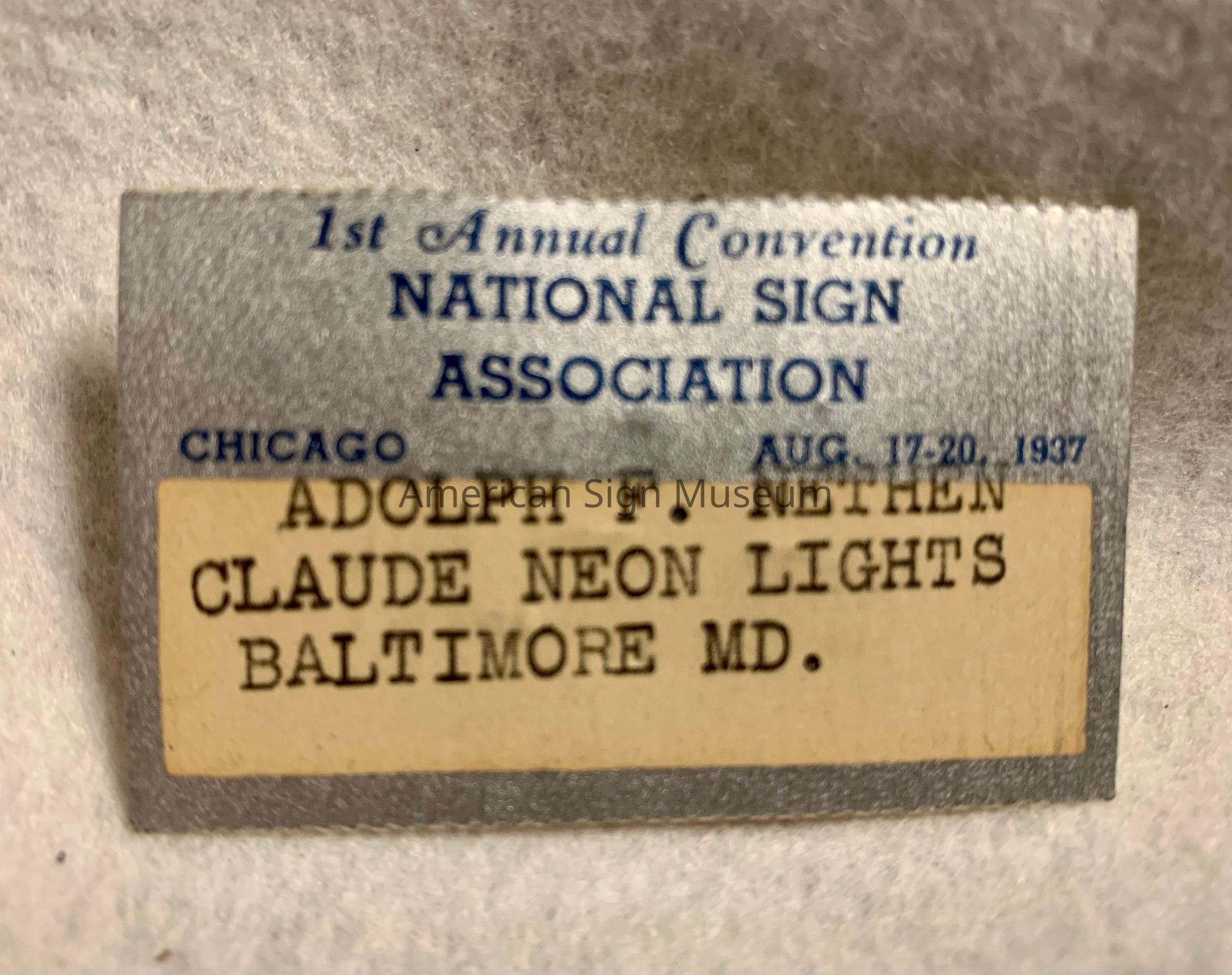 1937 National Sign Association Convention Name Badge - Adolph F. Nethen - Claude Neon Lights picture number 1