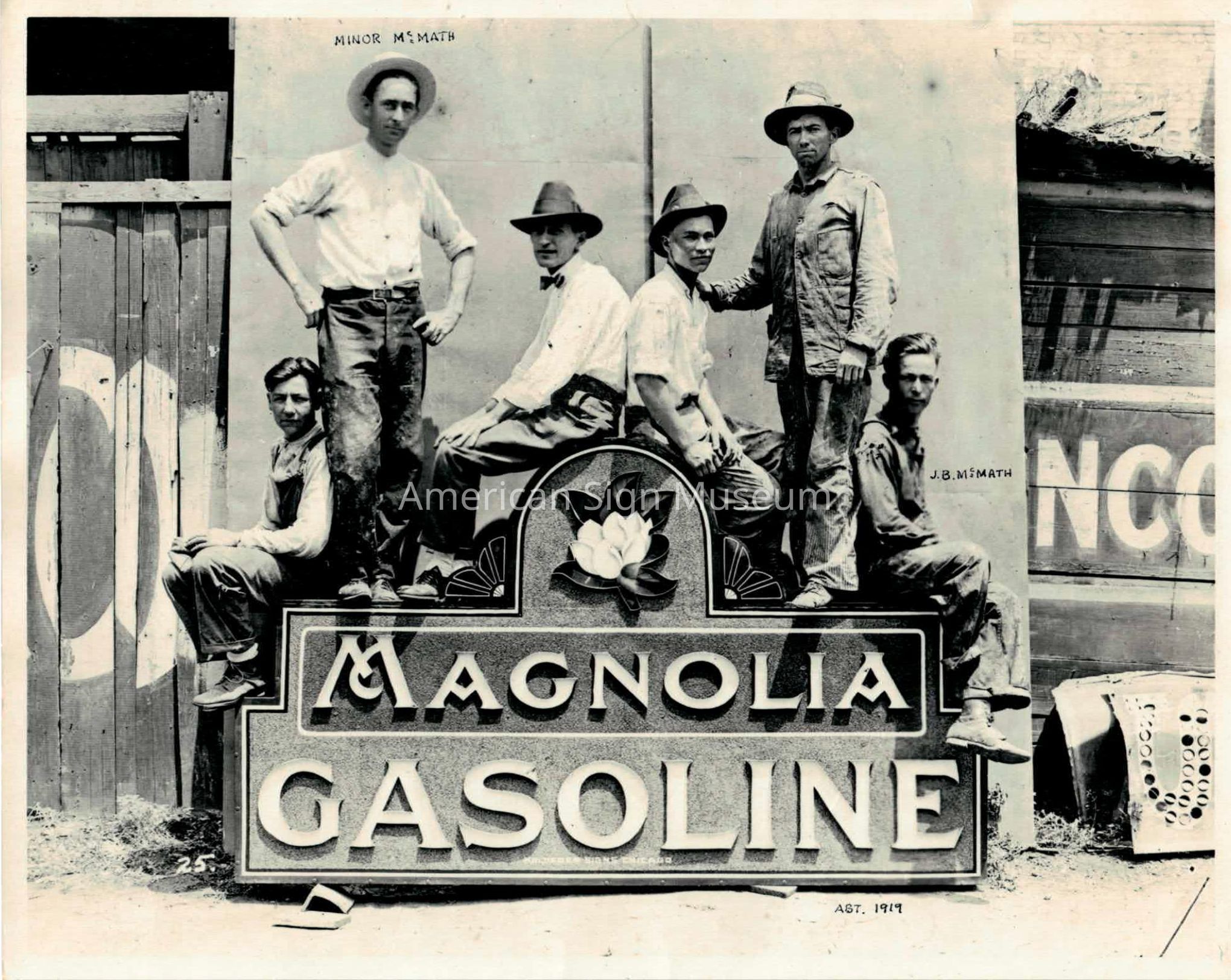 J.B. McMath, Minor McMath and other Figures with Magnolia Gasoline Sign - Photo picture number 1