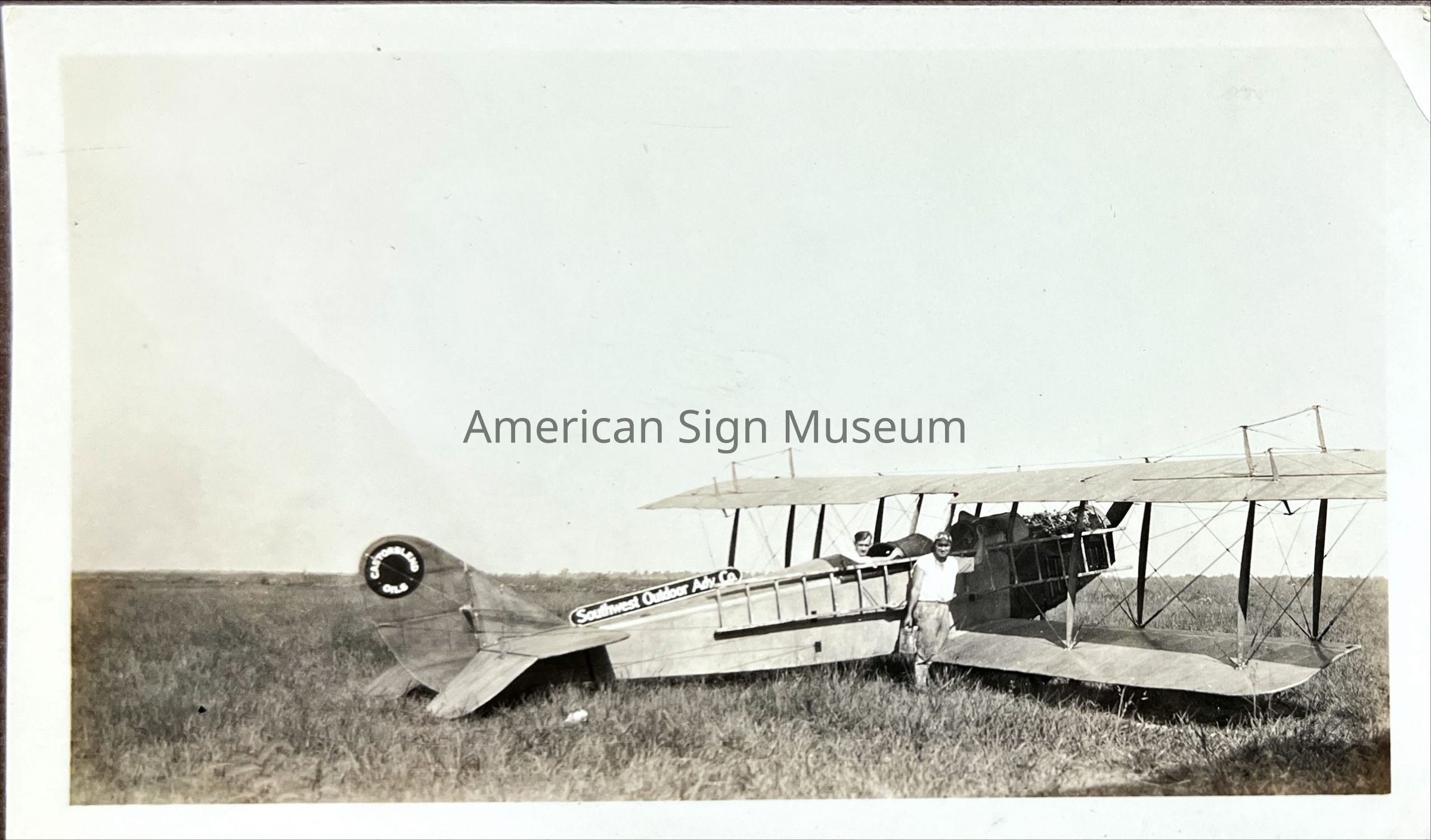 Southwest Outdoor Advertising Company Airplane with Figures - Photograph picture number 1