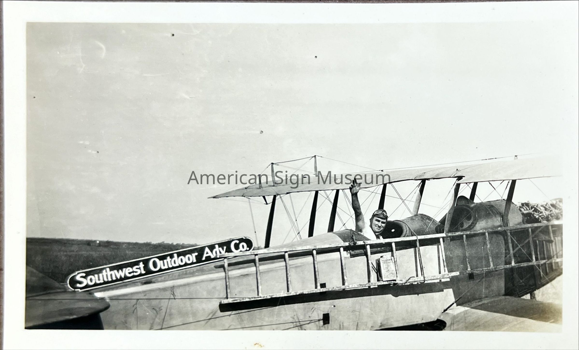 Southwest Outdoor Advertising Company Airplane with Figure - Photograph picture number 1