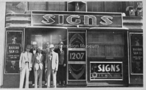 Raiford Sign Co. Exterior with Figures - Photograph picture number 1