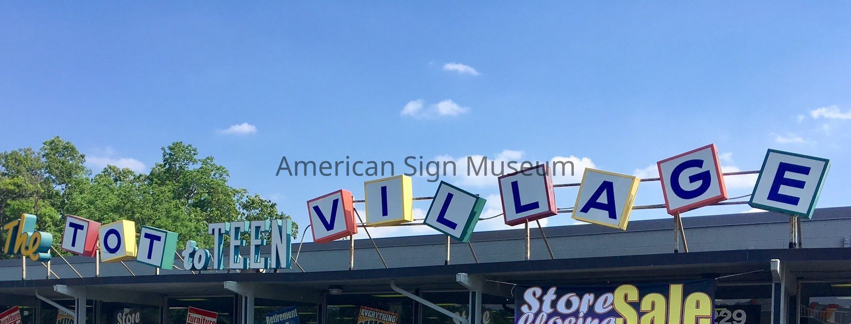 Tot to Teen Village Sign picture number 1