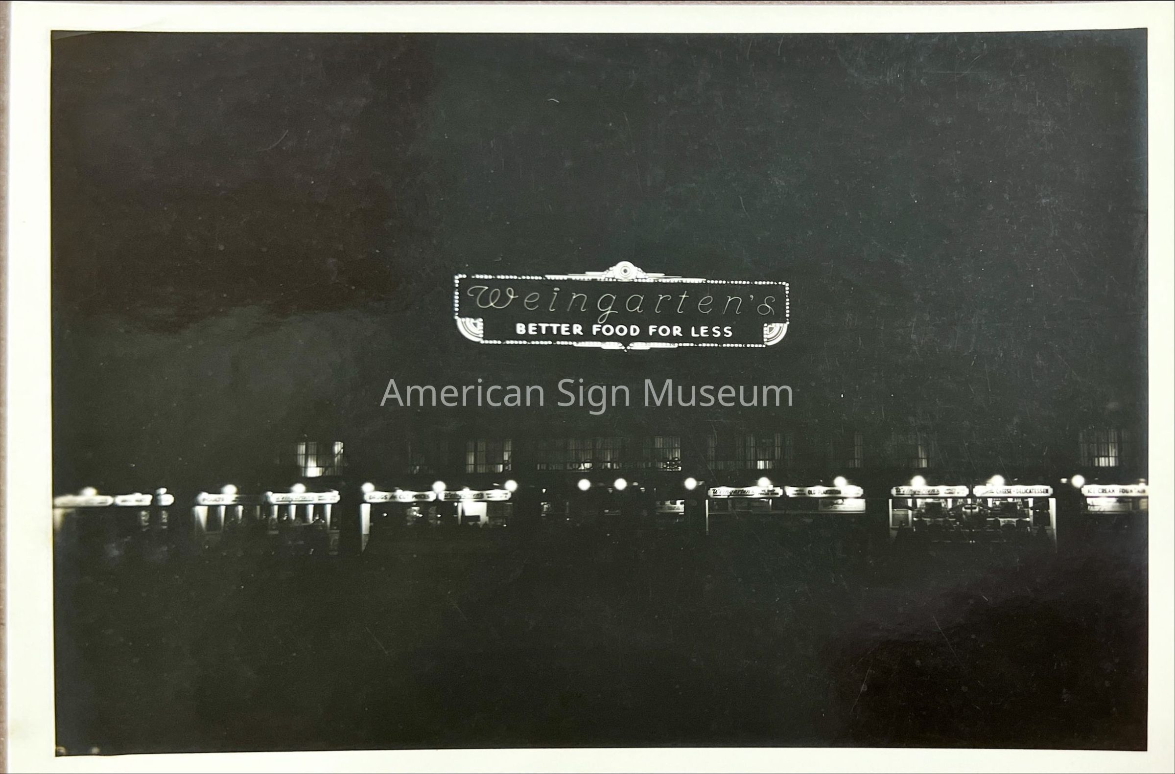 Weingarten's Early Neon Sign at Night - Photograph picture number 1