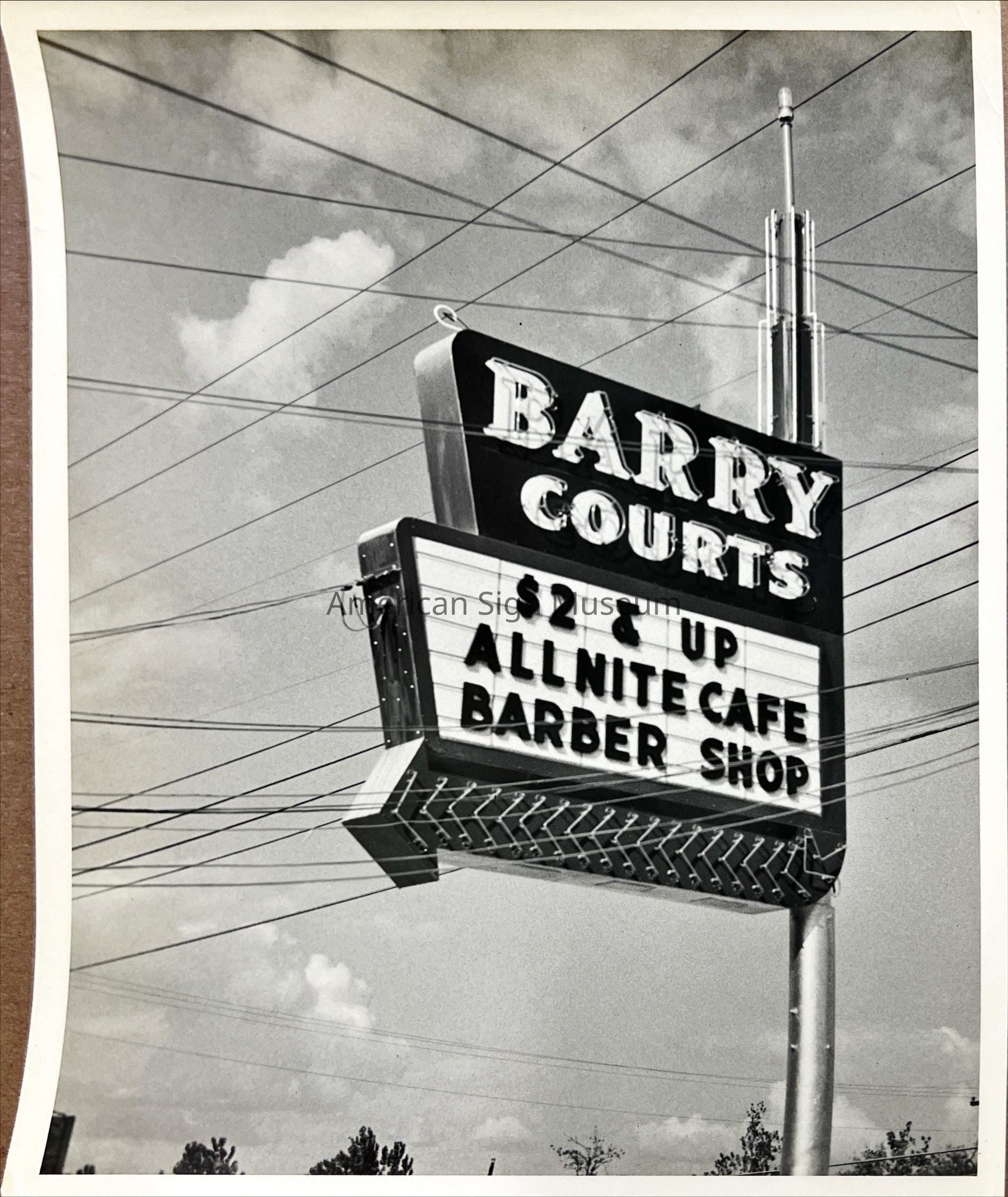 Barry Courts Early Neon Sign Daytime - Photograph picture number 1