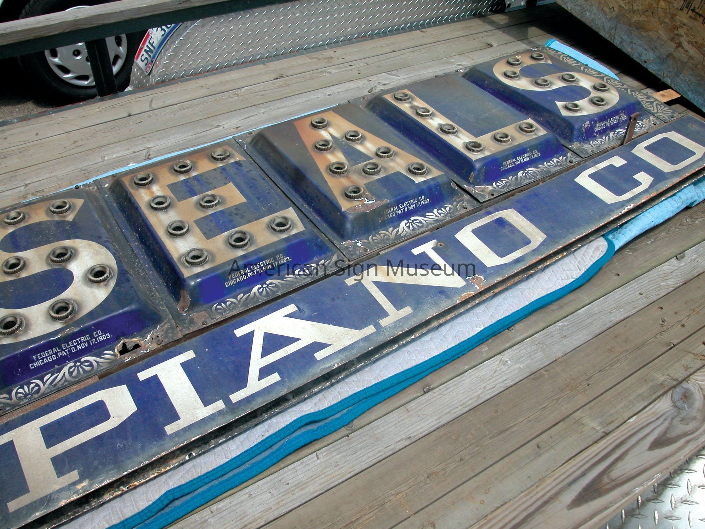 Seals Piano Co. Lightbulb Sign picture number 1