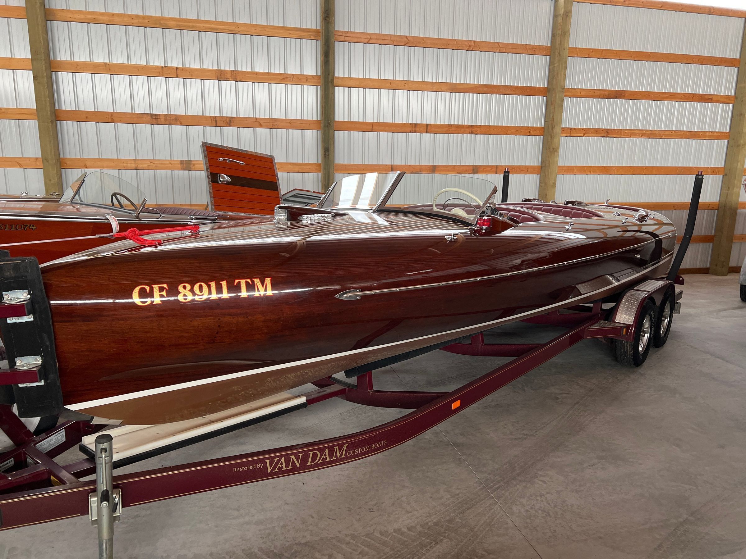 Claasic Canadian flair with the rounded covering boards and wood dck vents.