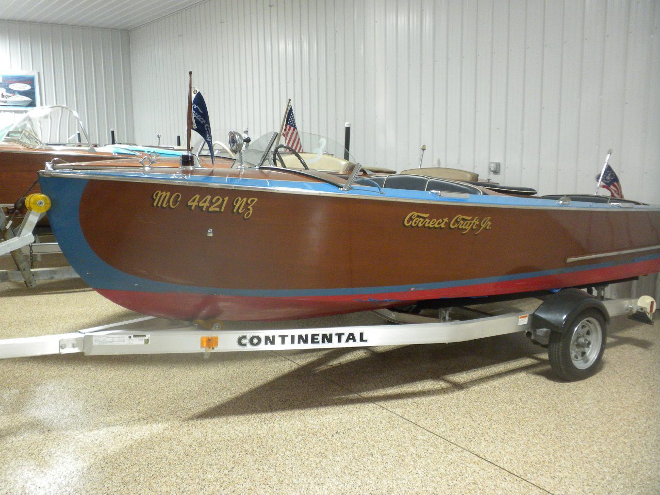 These classic, smaller wooden boats represent early, post-WWII