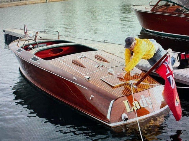 Canadian designer builder Earl Barnes was known for his Indian War Bonnet trademark on the bow.