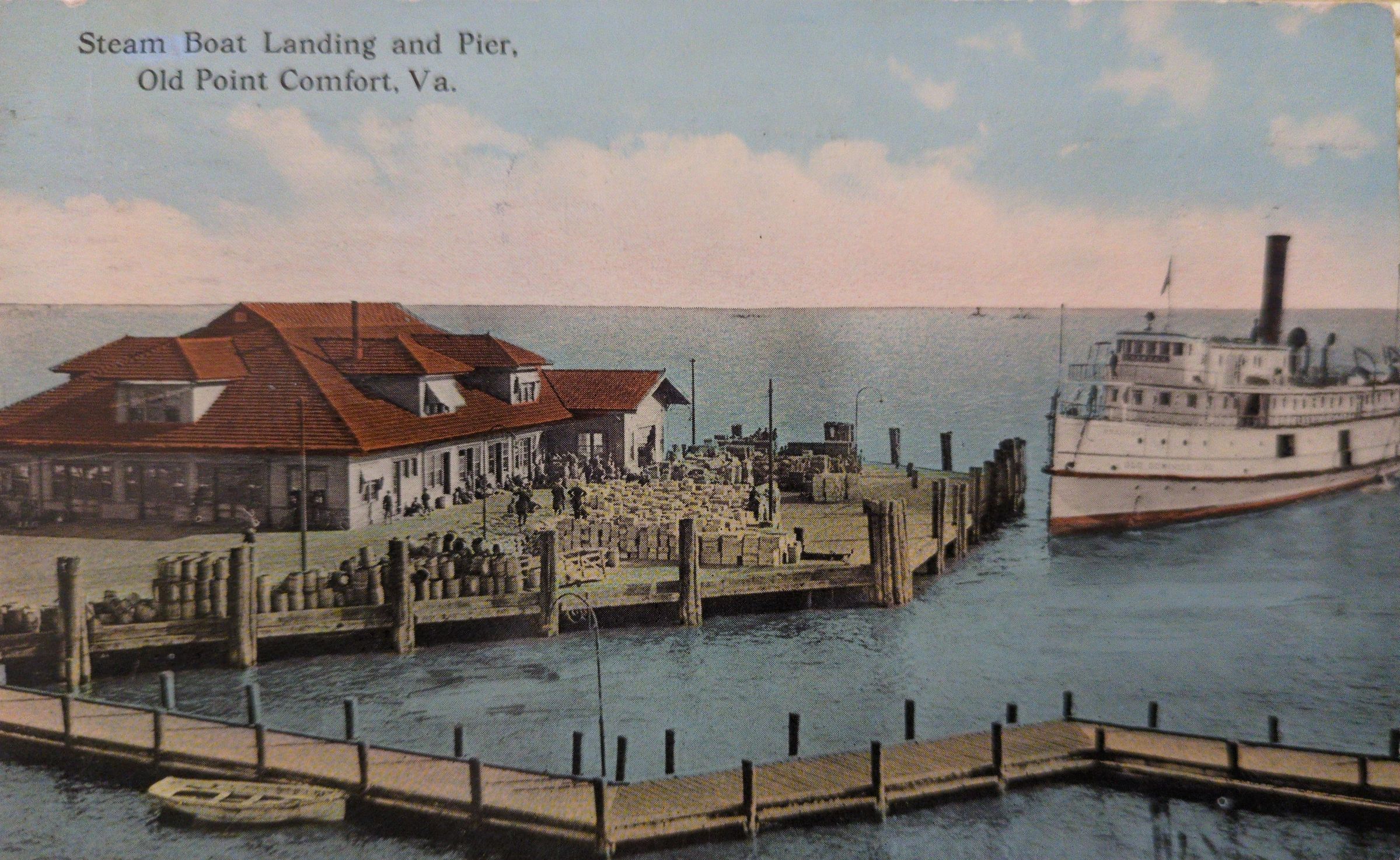 Steamboat Landing and Pier: Two postcards with the same image. The one shown here has a note and address on the reverse side and is postmarked Nov 22, 1912. Original accession number is 2017.07.19.12, picture number WH-003. The other is blank on the reverse side. Steamer approaching the pier has Old Dominion Line visible on the port side. Picture number is WH-017B.
