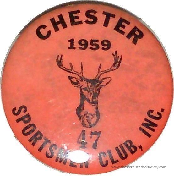 1959 Chester Sportsmen Club pin #47: The image shows a round, vintage metal badge with an orange background displaying the text " 1959" at the top and "CHESTER SPORTSMEN'S CLUB, INC." around the edge with a central illustration of a deer head featuring antlers, accompanied by the number "47" below the deer, suggesting it may represent membership or identify someone belonging to the club. The overall appearance and design indicate an association with hunting or outdoor activities, typical of sporting organizations or clubs from that era.