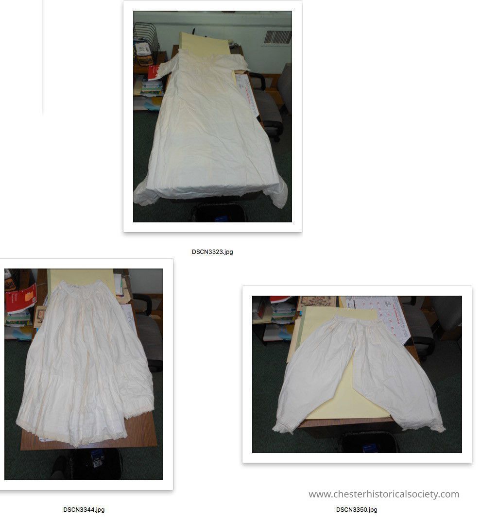 A. Hess undergarment set: The images depict three white garments displayed on tables. The first image shows a long-sleeved, full-length gown arranged neatly on a table. The second image features a long, white skirt with pleats. The third image displays a pair of loose white bloomers, also positioned on a table.