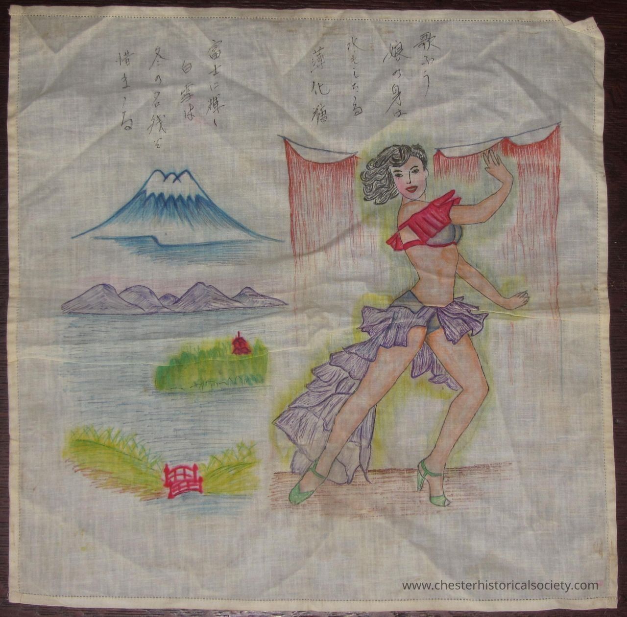 John J. McGrath's Souvenir Hankie (Occidental): The image depicts a colorful illustration on a cloth, featuring a woman in a vibrant, flowing outfit striking a dance pose beside a red curtain. Her attire includes purple and red elements, complemented by green high heels. To the left, a tranquil landscape scene showcases a blue mountain, resembling Mount Fuji, and a lakeside view with two small red bridges and lush greenery. Japanese calligraphy is visible near the top, adding an artistic and cultural touch to this creative composition, blending elements of nature and lively expression