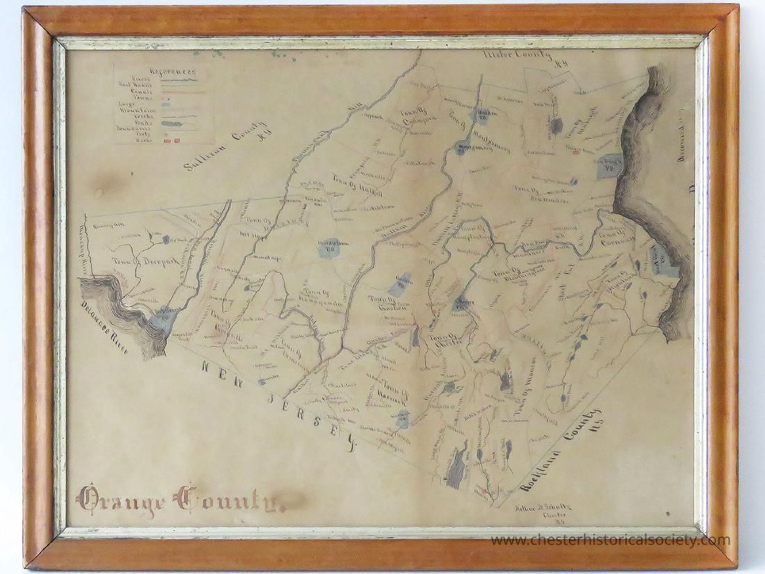 Circa 1850/60 Orange County, NY Map: The image displays an old, framed map of Orange County, featuring hand-drawn details of towns, rivers, and boundaries, with New Jersey marked prominently to the south. It includes a legend in the top left corner, identifying various symbols and references, and the map is encased in a wooden frame that adds an antique touch. The map's intricate detailing shows settlements and regions, and handwriting can be observed across different areas, giving an impression of historical mapping techniques used during that period.