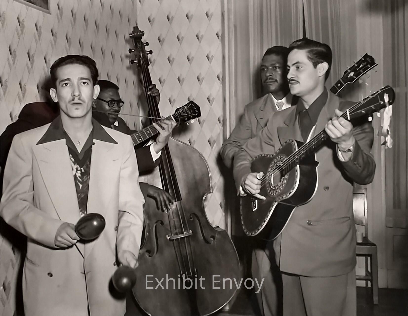 This mixed band of Pinoy, Latino, and African American musicians entertain at a house party in the 1950s. While prejudice and discrimination prevented many people of color from joining the ranks of white collar employees, men and women of many groups worked together and learned from one another on the job site.