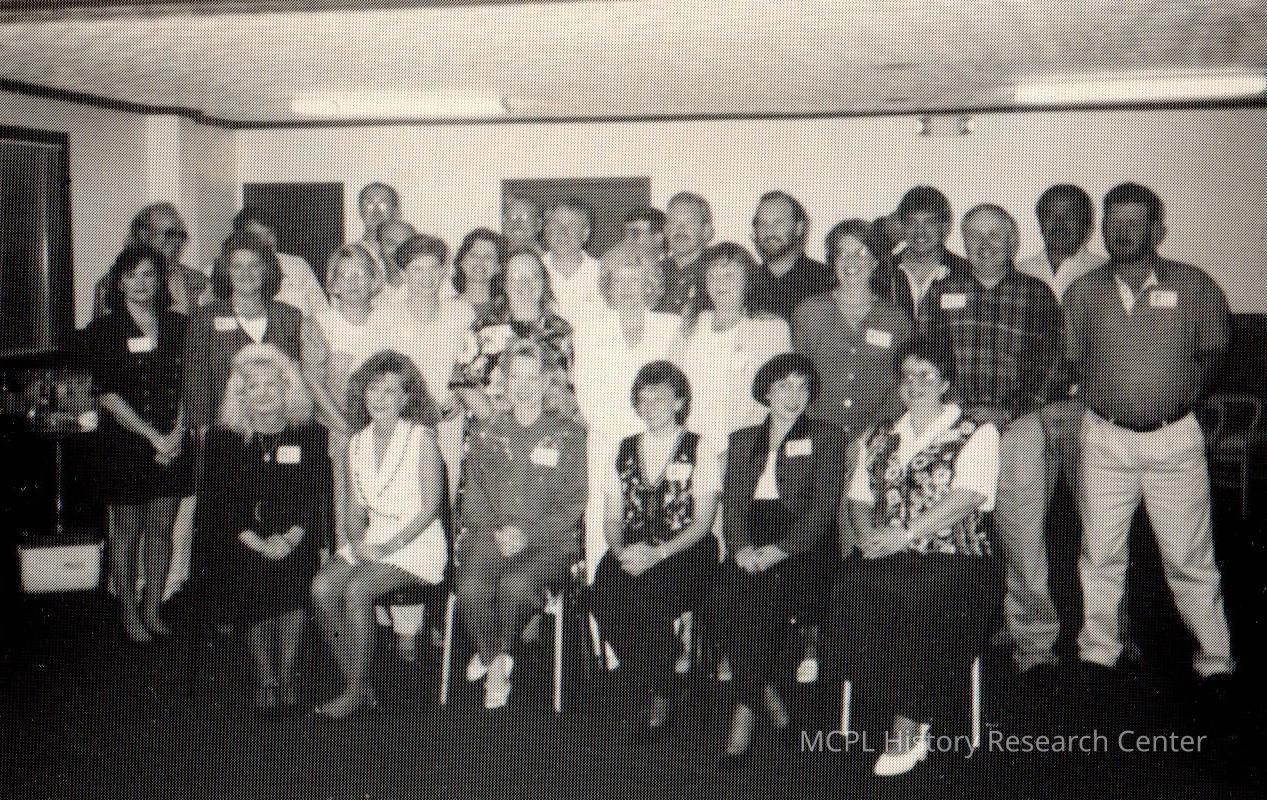 MCHS Class of 1971 taken at their 25th Reunion: Pictured (L to R) on the Front Row: Helen Lewis Baker, Donna Humphery Lakes, Jane Birch Pickett, Rhonda Orwig Beasley, Patty Holderman Lambly, and Ada Phillips Johnson 2nd row: Sherri Hazelwood Stivers, Pam Woods Thompson, Freida Robinson Smith, kathryn Tuggle, Sharon Peyton Clark, Pam Gammon Votaw, Diana Bottoms Hart, Debra Durham Rawlins, Rosemary Dean Lay, and Lee Thompson. Back row: Billy Joe Robinson, Eddie Lay, Marshall herring, Charles Monroe, Steve Stratton, Danny Holiday, Bill Simkins, Dennis Coslow, Bill Pickett, Kenny Parker, Kenny Beasley, and Bobby Pugh.
